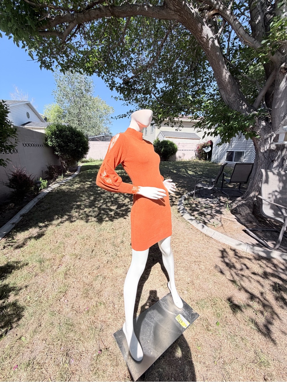 Sleek Orange Long-Sleeve Mini Dress with Eyelet Sleeve Detail